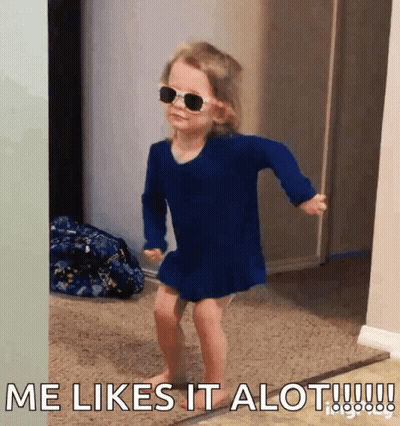 A Little Girl Wearing Sunglasses And A Blue Dress Says Me Likes It Alot !!! GIF