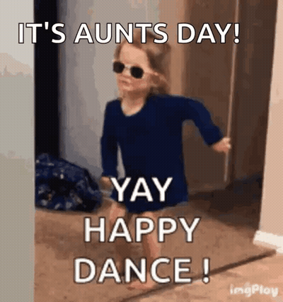 A Little Girl Wearing Sunglasses And A Blue Shirt Is Dancing In A Room . GIF