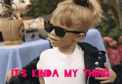 A Little Girl Wearing Sunglasses And A Leather Jacket Is Saying It 'S Kinda My Thing GIF