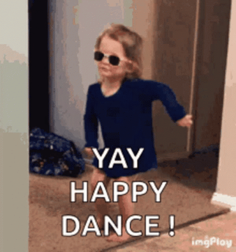 A Little Girl Wearing Sunglasses Is Dancing In A Hallway And Says `` Yay Happy Dance '' . GIF