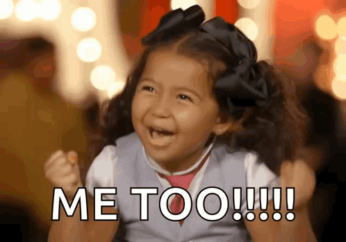 A Little Girl With A Black Bow On Her Head Says Me Too !!! GIF