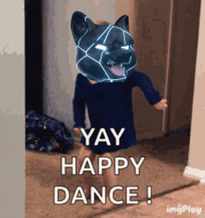A Little Girl With A Cat Mask On Her Head Says Yay Happy Dance ! GIF