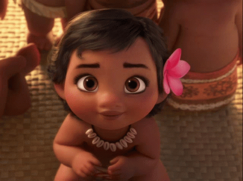A Little Girl With A Flower In Her Hair Is Wearing A Necklace That Says ' 00000 ' On It GIF