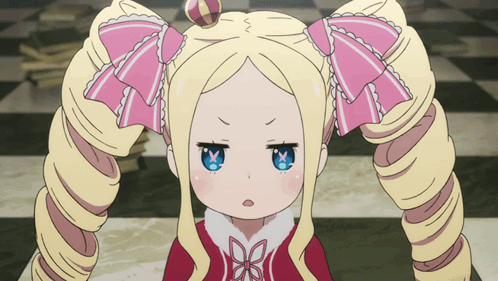 A Little Girl With Blonde Hair And Blue Eyes Has A Pink Bow On Her Hair GIF