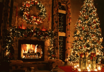 A Living Room Decorated For Christmas With A Fireplace And Christmas Trees GIF