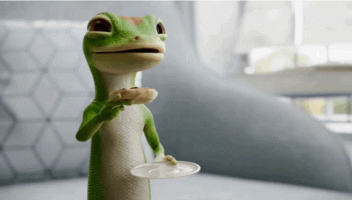 A Lizard Holding A Plate And A Cookie In Its Mouth GIF