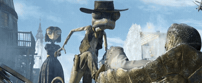A Lizard Wearing A Cowboy Hat Stands Next To A Woman And A Turtle GIF