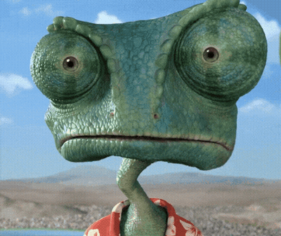 A Lizard Wearing A Hawaiian Shirt Looks Angry GIF