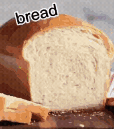 A Loaf Of Bread With The Word Bread On It GIF
