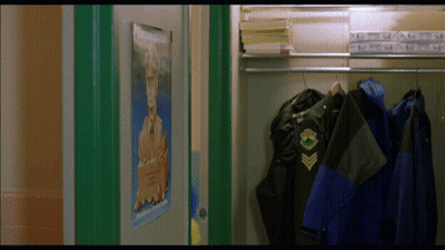 A Locker With A Poster On The Door That Says ' A Few Steps To Freedom ' GIF