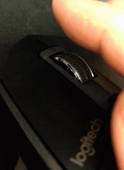 A Logitech Mouse Is Being Used By A Person GIF