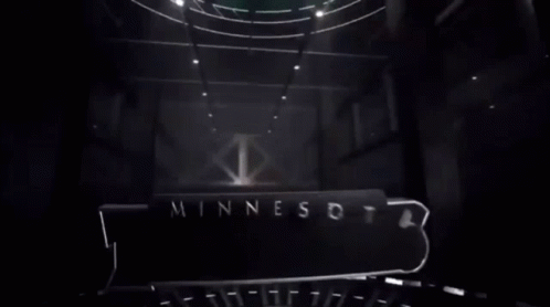 A Logo For The Minnesota Timberwolves With A Wolf GIF