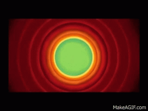 A Looney Tunes Logo With A Green Circle In The Middle Of It GIF
