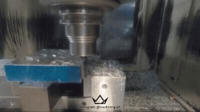 A Machine Is Cutting A Piece Of Metal With Instagram @ Machining.art Written On The Bottom GIF