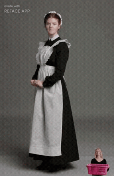 A Maid In A Black And White Dress Is Made With Reface App GIF