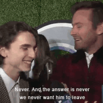 A Man And A Boy Are Talking To Each Other On A Red Carpet And The Answer Is Never We Never Want Him To Leave . GIF