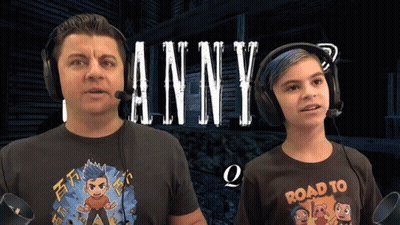 A Man And A Boy Wearing Headphones Are Playing A Game Called Tanny GIF