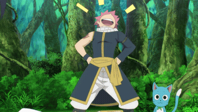 A Man And A Cat Are Standing In A Forest And The Cat Is Smiling GIF