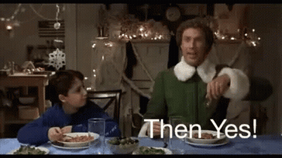 A Man And A Child Are Sitting At A Table With Plates Of Food And Glasses Of Wine . GIF
