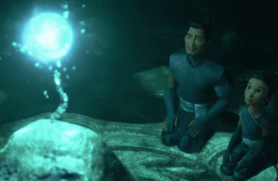 a man and a girl are looking at a glowing object in the water
