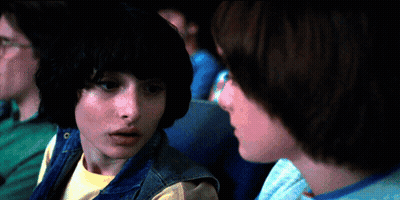 A Man And A Girl Are Looking At Each Other GIF