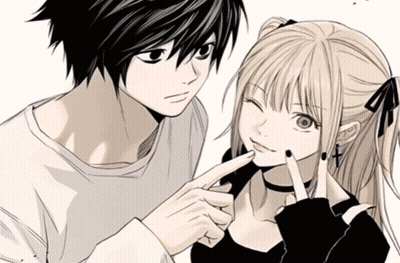 A Man And A Girl Are Standing Next To Each Other And The Girl Is Pointing At The Man 'S Face GIF