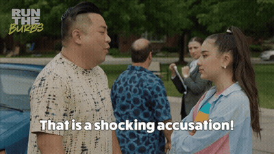 A Man And A Girl Are Standing Next To Each Other With The Words That Is A Shocking Accusation GIF