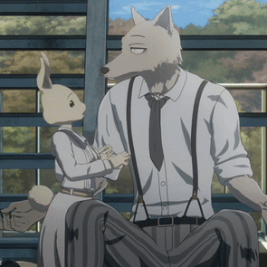 A Man And A Rabbit Are Standing Next To Each Other And Talking GIF