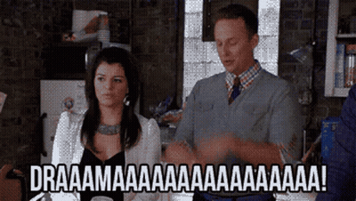 A Man And A Woman Are Clapping Their Hands In A Kitchen With The Words Draaamaaa Written On The Bottom GIF