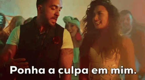 A Man And A Woman Are Dancing At A Party And The Woman Is Saying Ponha A Culpa Em Mim GIF