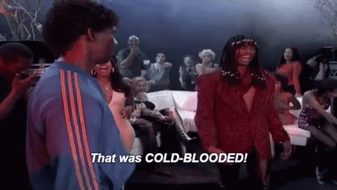 A Man And A Woman Are Dancing In A Club And The Man Is Saying `` That Was Cold Blooded '' . GIF