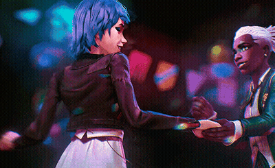 A Man And A Woman Are Dancing In A Dark Room GIF