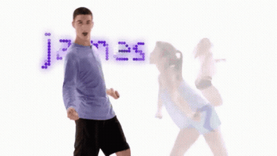 A Man And A Woman Are Dancing In Front Of A Sign That Says Jair.es Riley GIF