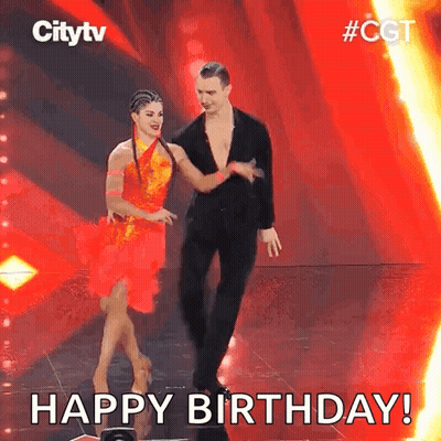 A Man And A Woman Are Dancing On A Stage With The Words Happy Birthday . GIF