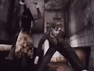 A Man And A Woman Are Fighting In A Dark Room In A Video Game . GIF