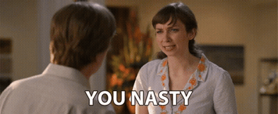 A Man And A Woman Are Having A Conversation And The Woman Is Saying You Nasty GIF