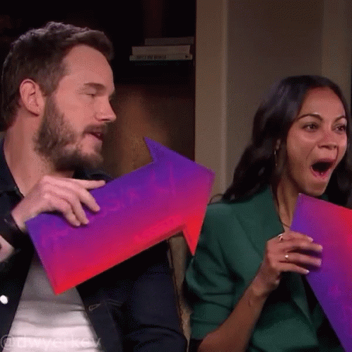 A Man And A Woman Are Holding Signs That Say ' Style ' GIF