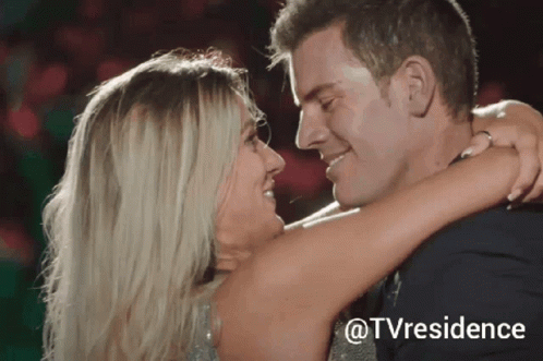 A Man And A Woman Are Hugging And Looking Into Each Other 'S Eyes With The Words @Tvresidence Visible In The Corner GIF