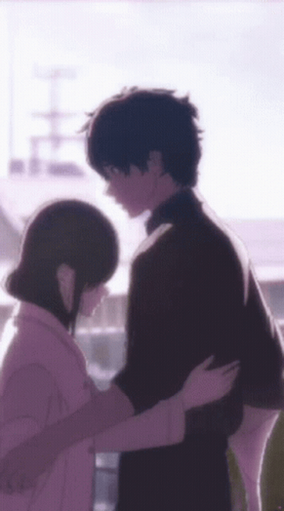 A Man And A Woman Are Hugging Each Other In A Cartoon GIF