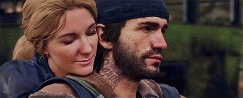 A Man And A Woman Are Hugging Each Other . The Woman Has A Tattoo On Her Neck . GIF