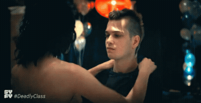 A Man And A Woman Are Hugging In A Scene From The Tv Series Deadly Class GIF