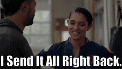 A Man And A Woman Are Hugging With The Words I Send It All Right Back GIF