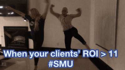 A Man And A Woman Are Jumping In The Air With The Caption When Your Clients Roi > 11 GIF