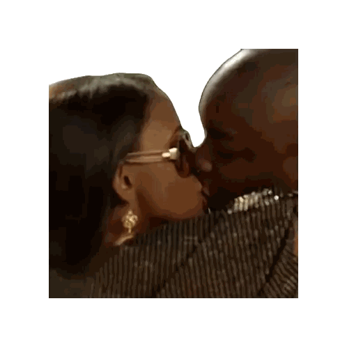 A Man And A Woman Are Kissing And The Woman Is Wearing Glasses Sticker