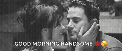 A Man And A Woman Are Kissing In A Black And White Photo With The Words `` Good Morning Handsome '' . GIF