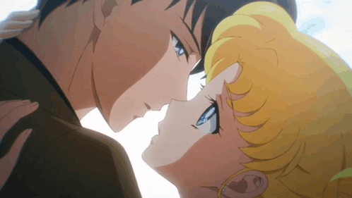 A Man And A Woman Are Kissing In A Cartoon GIF