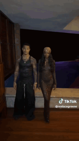 A Man And A Woman Are Kissing In Front Of A Pool With Tiktok Written In The Corner GIF