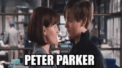 A Man And A Woman Are Kissing In Front Of A Sign That Says Peter Parker On It . GIF