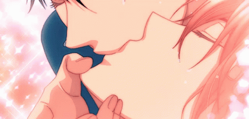 A Man And A Woman Are Kissing With Tears Coming Down Their Faces GIF