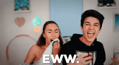 A Man And A Woman Are Laughing With The Words Eww Written On The Bottom GIF
